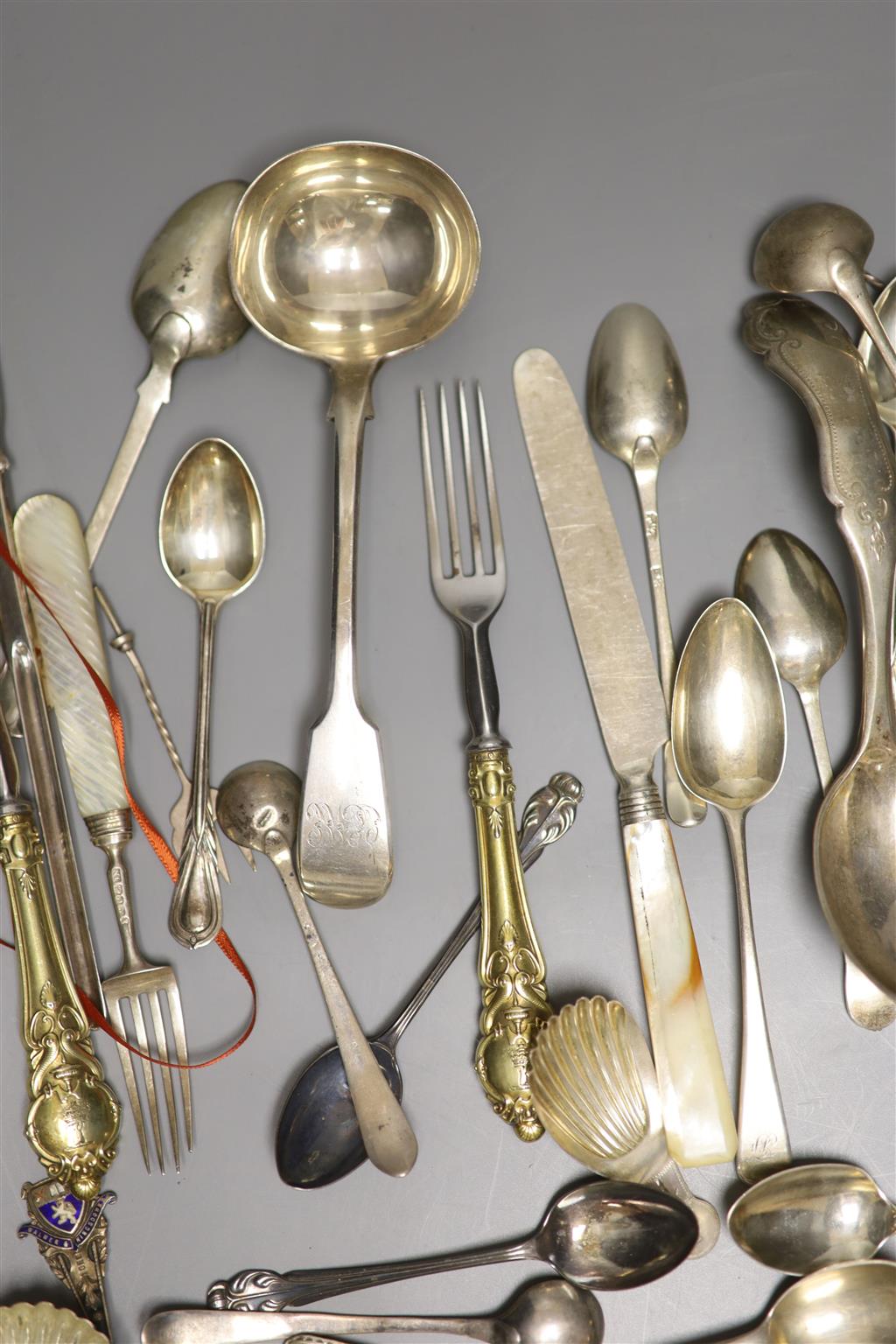 A mixed group of assorted silver and white metal items